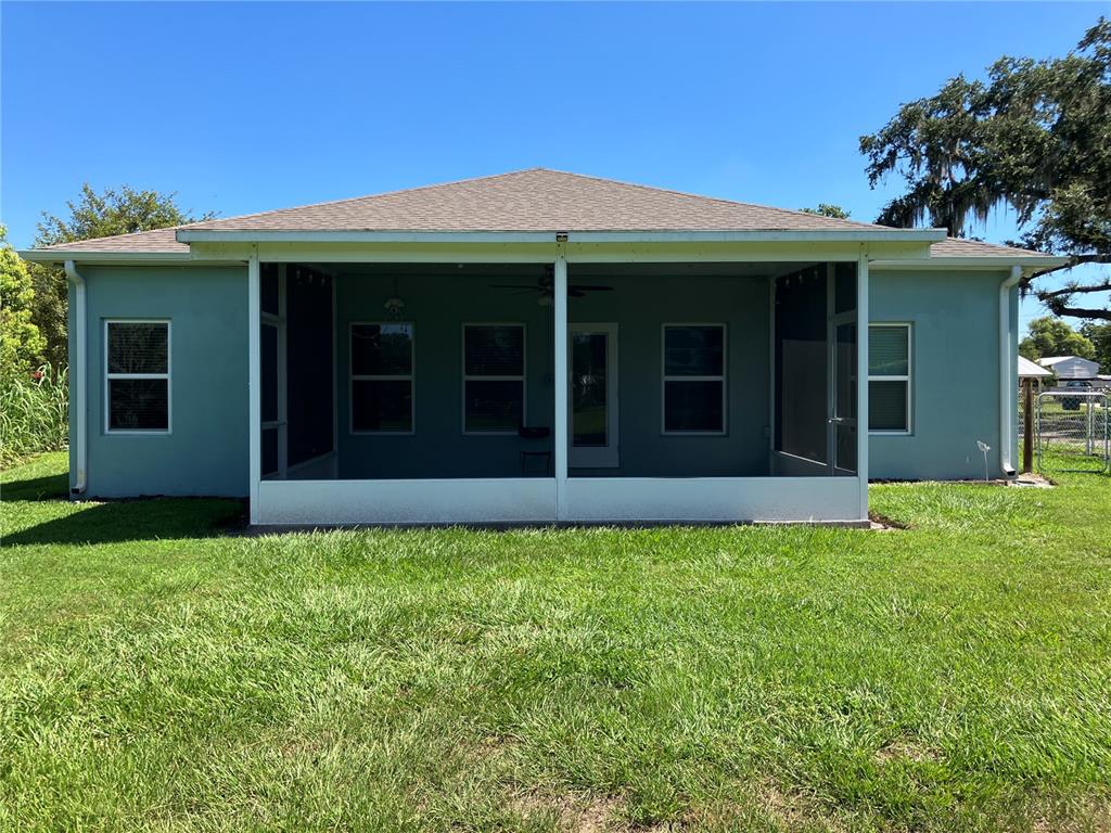 3834 Charter Road Lakeland, FL 33810 - Photo 29 of 39 a view of a house with a garden