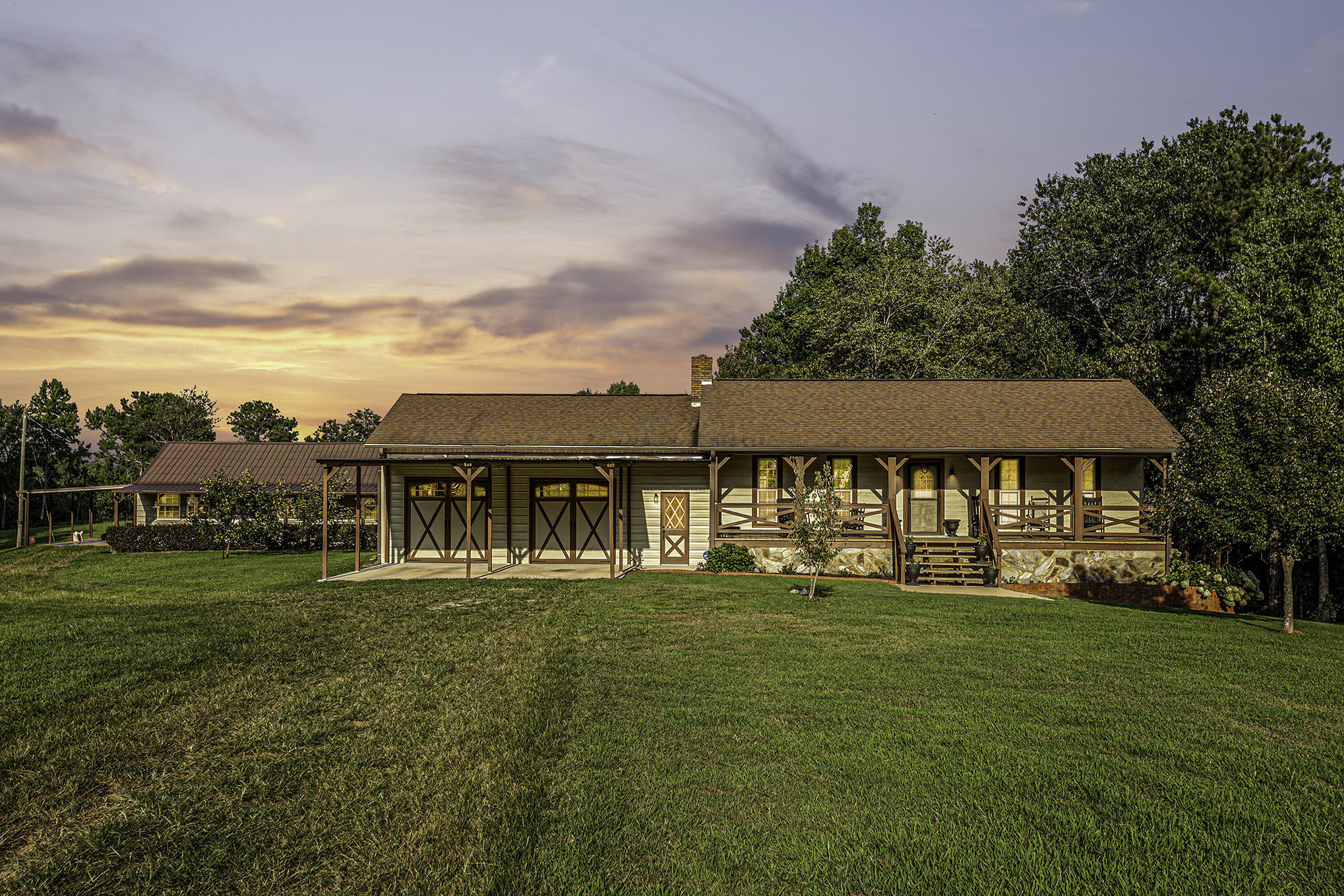 1400 High Point Road Bowdon, GA 30108 - Photo 1 of 1 a front view of a house with a garden