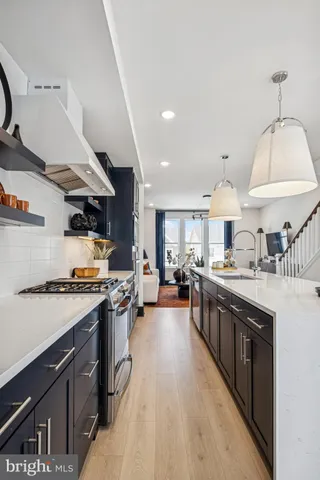 a kitchen with lots of counter top space and a sink
