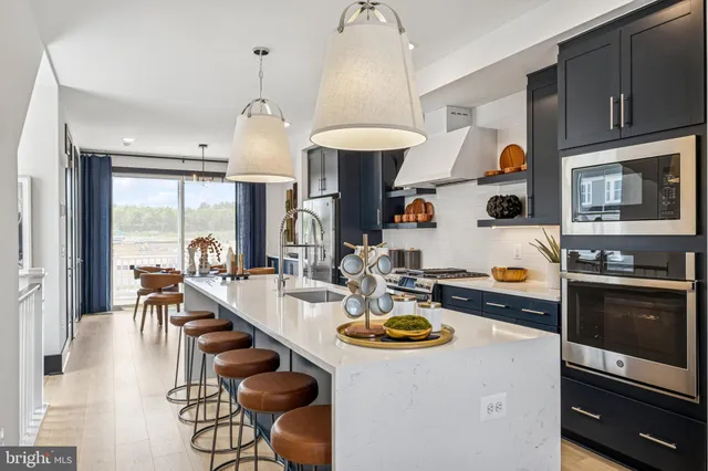 a kitchen with sink and stove
