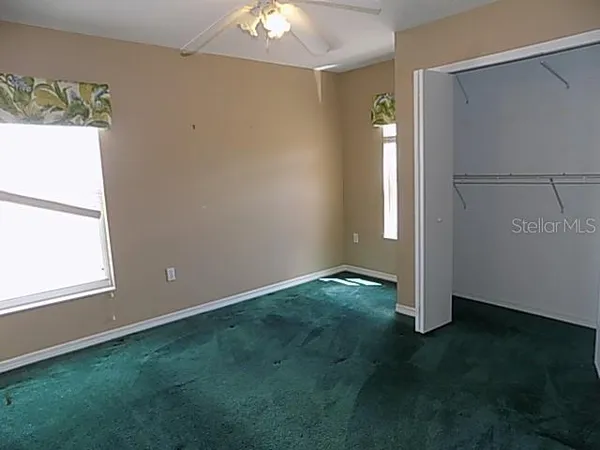 an empty room with windows