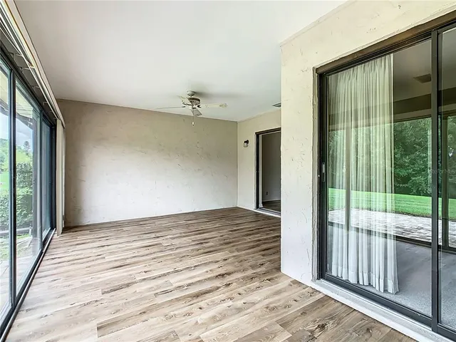 a front view of a house with a yard and porch