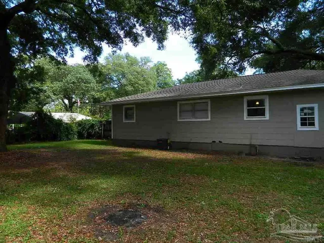 a view of a trees in a yard