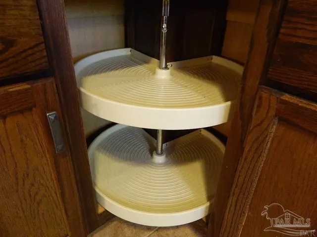 a view of dining room with table and chairs