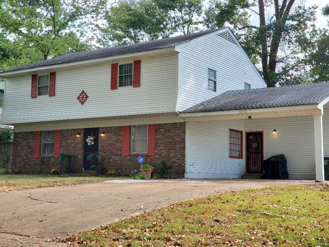3232 Canisbay Road Memphis, TN 38128 - Photo 1 of 23 a front view of house with yard