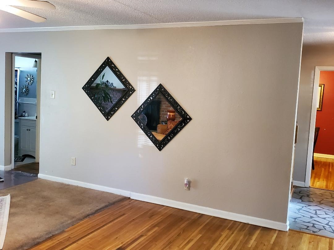 3232 Canisbay Road Memphis, TN 38128 - Photo 6 of 23 a view of a hallway with wooden floor and a window