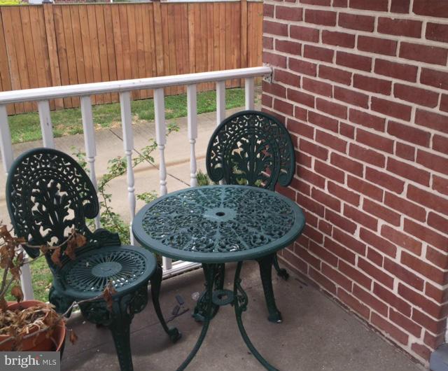 3014 Dunmurry Road Baltimore, MD 21222 - Photo 2 of 24 a view of a chairs and table in a patio