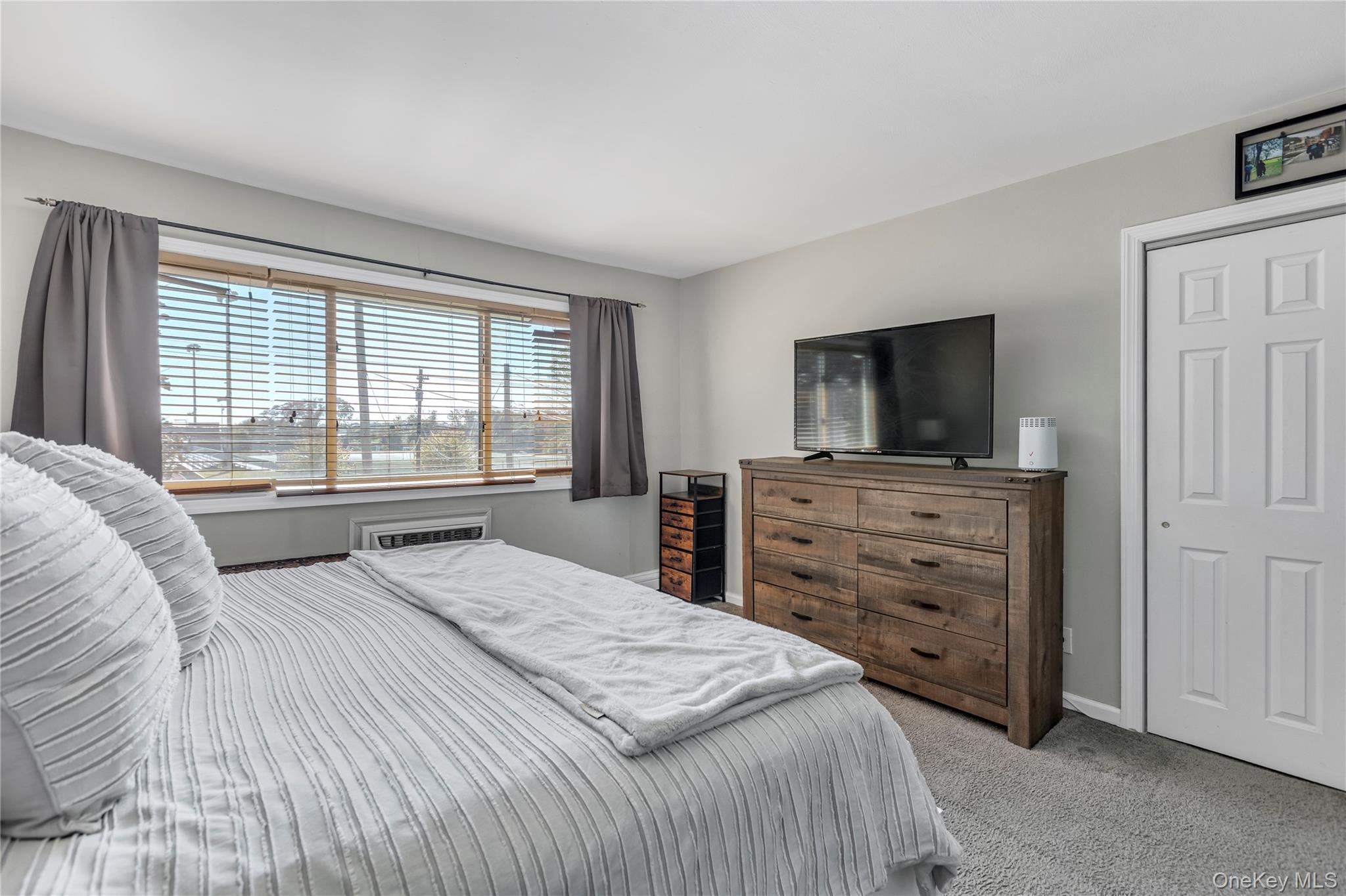 2423 Union Boulevard, Unit 8B Islip, NY 11751 - Photo 8 of 14 Carpeted bedroom featuring baseboards