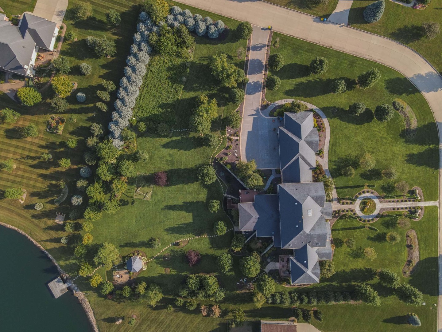 an aerial view of houses with yard