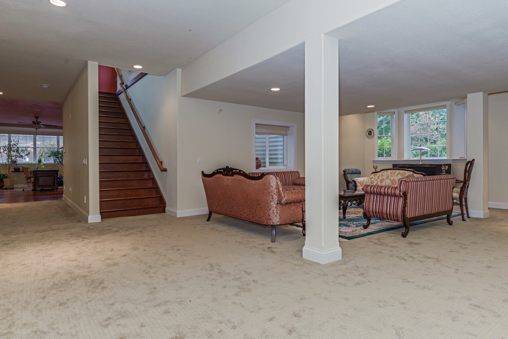 10470 Sturbridge Road Bloomington, IL 61705 - Photo 50 of 75 a living room with furniture and a large window