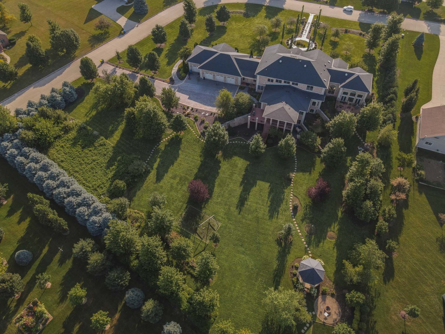 10470 Sturbridge Road Bloomington, IL 61705 - Photo 74 of 75 an aerial view of a house with a yard