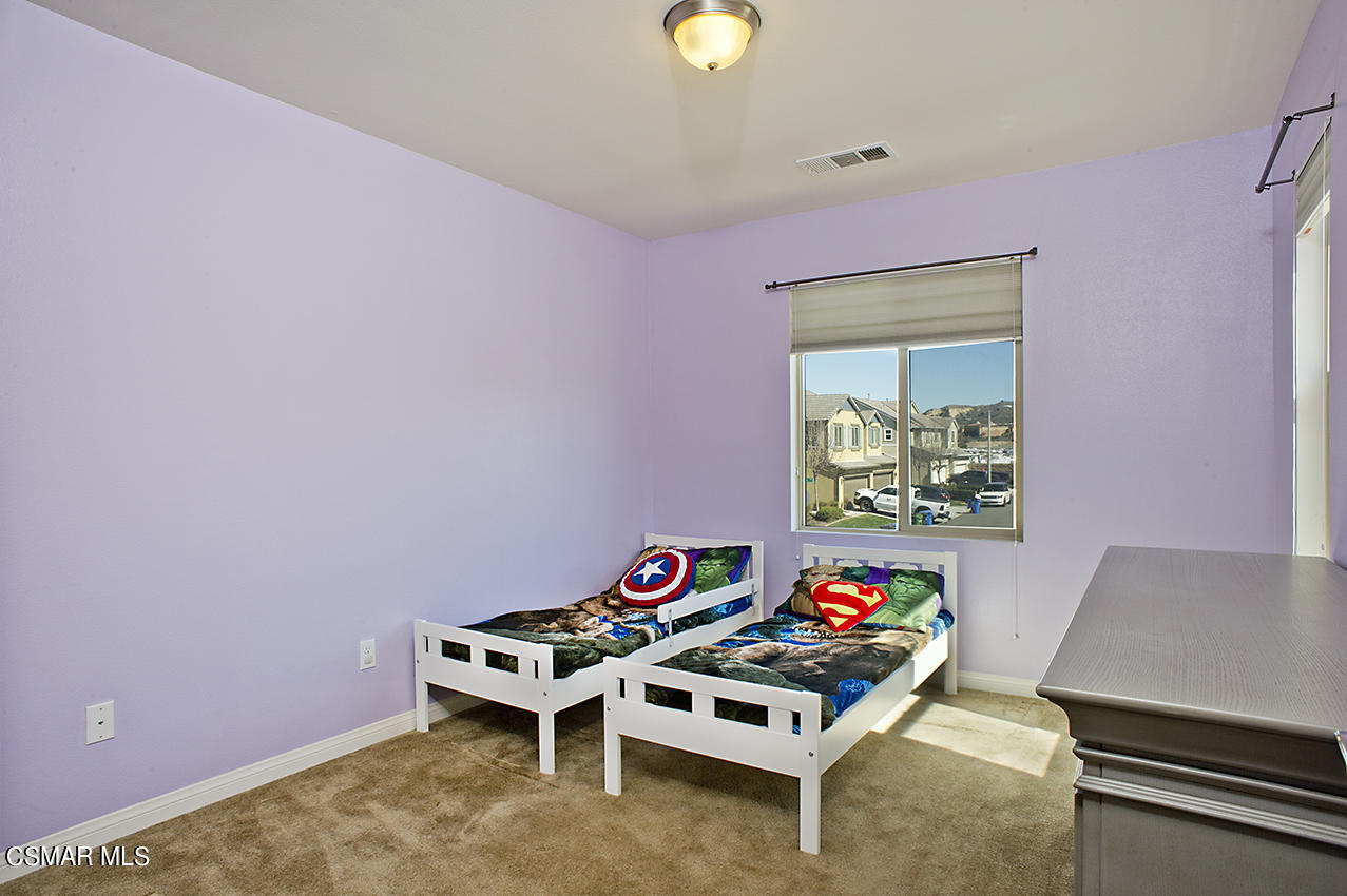 4813 Edenbridge Road Moorpark, CA 93021 - Photo 22 of 33 a living room with furniture and a table