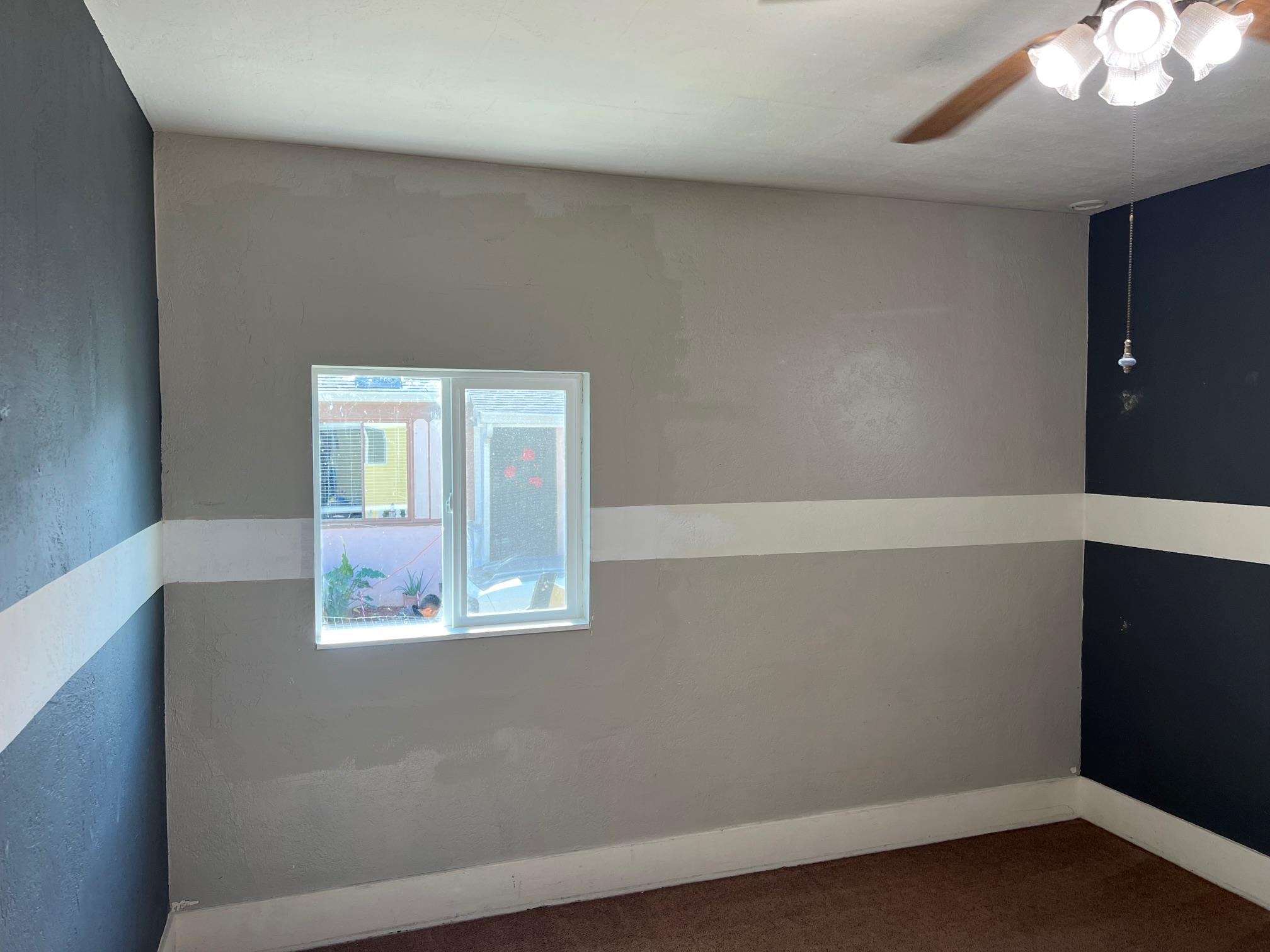 22771 Inyo Street Hayward, CA 94541 - Photo 21 of 29 an empty room with wooden floor and windows