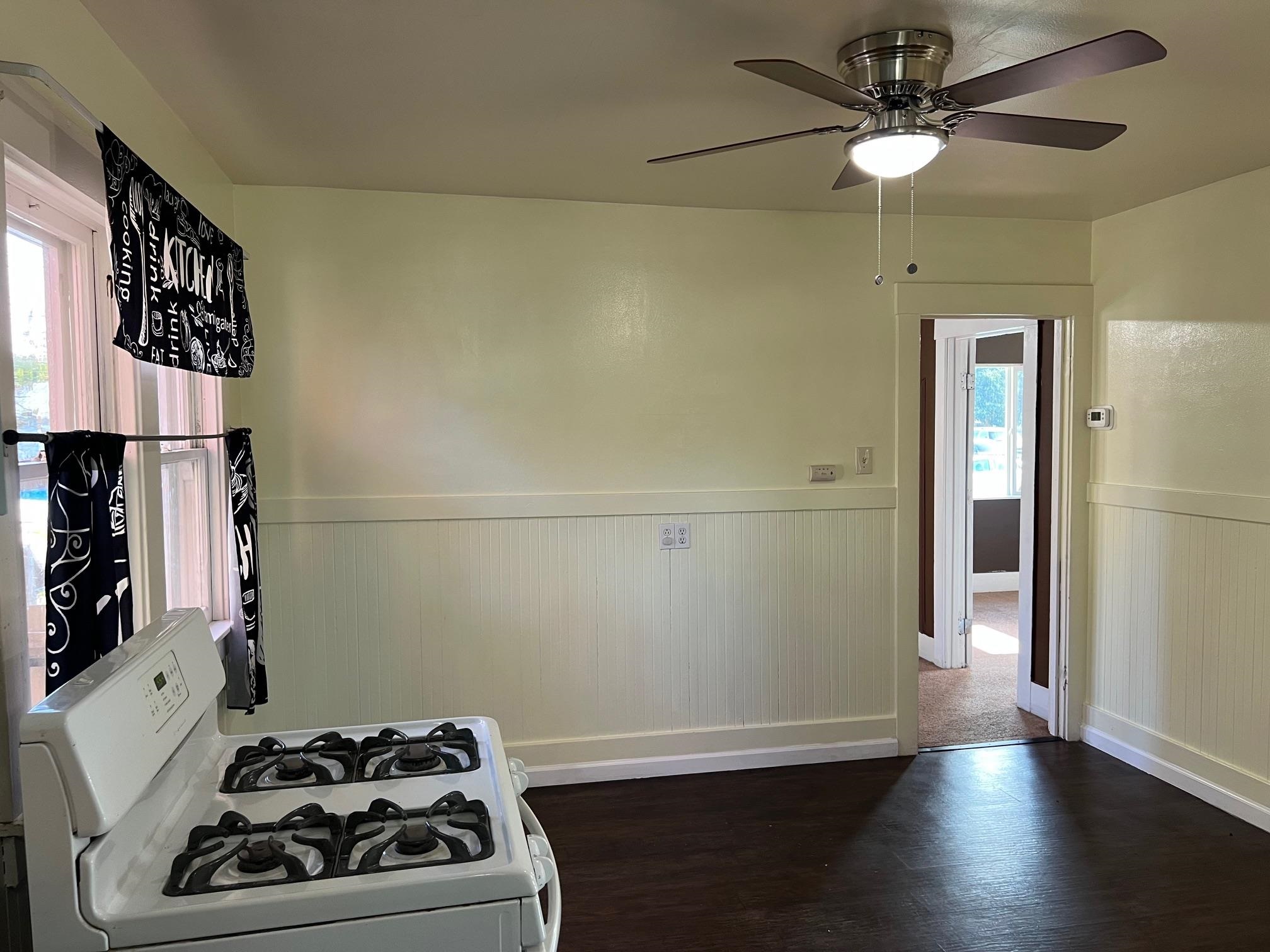 22771 Inyo Street Hayward, CA 94541 - Photo 3 of 29 a view of a livingroom with wooden floor and a ceiling fan