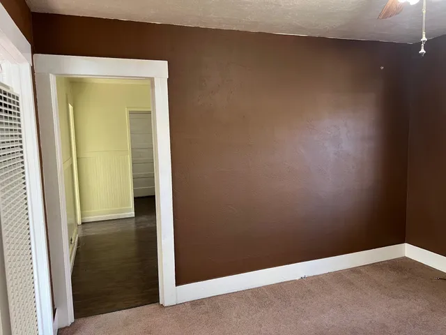 an empty room with a door
