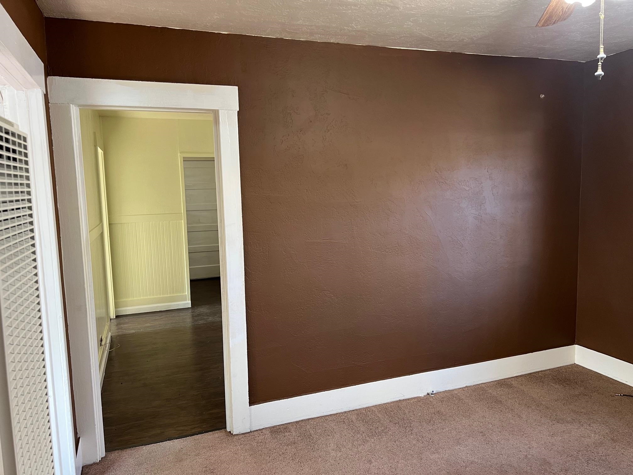 22771 Inyo Street Hayward, CA 94541 - Photo 8 of 29 an empty room with a door