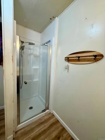 a bathroom with a double vanity sink mirror and toilet