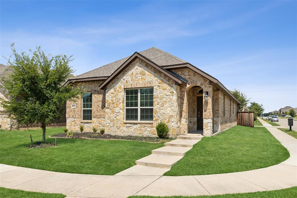 4500 Ashmark Road Aubrey, TX 76227 - Photo 1 of 1 a front view of a house with a garden and plants