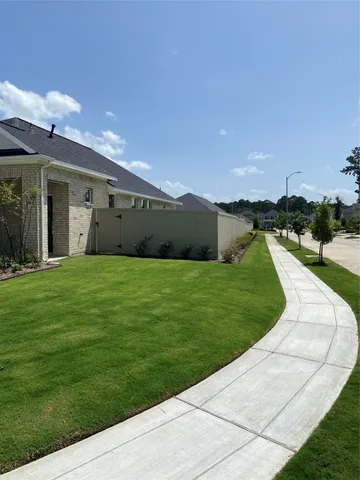 a view of a porch with a garden