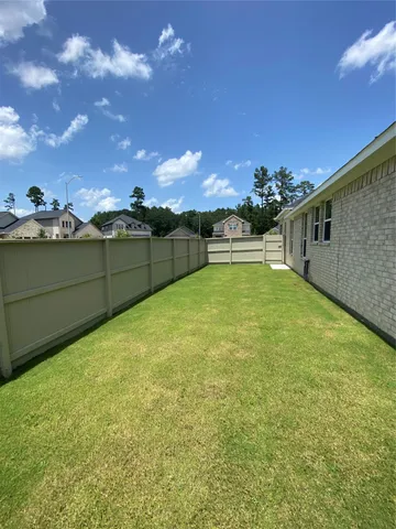 a view of a swimming pool with an ocean view