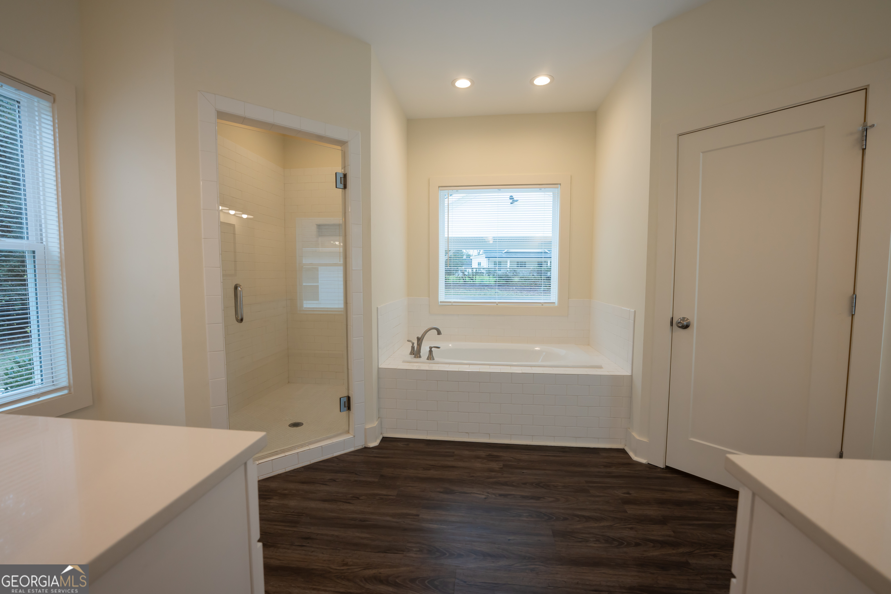 1000 Bell Circle Madison, GA 30650 - Photo 11 of 21 a bathroom with a bathtub and a sink