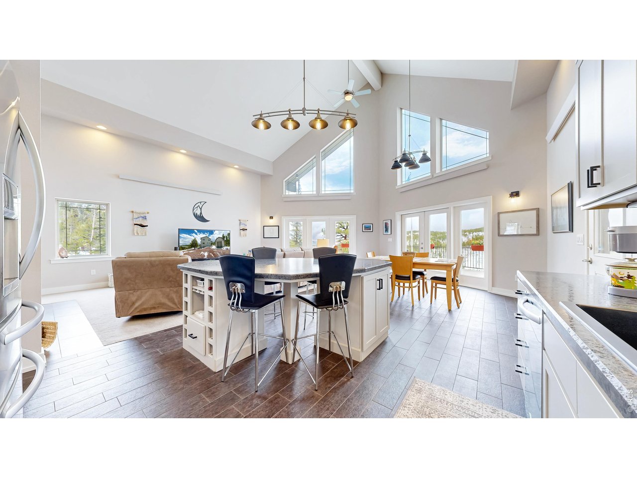 296 Elkridge Road Red Feather Lakes, CO 80545 - Photo 11 of 47 Kitchen positioned so chef can interact w/ family or guests