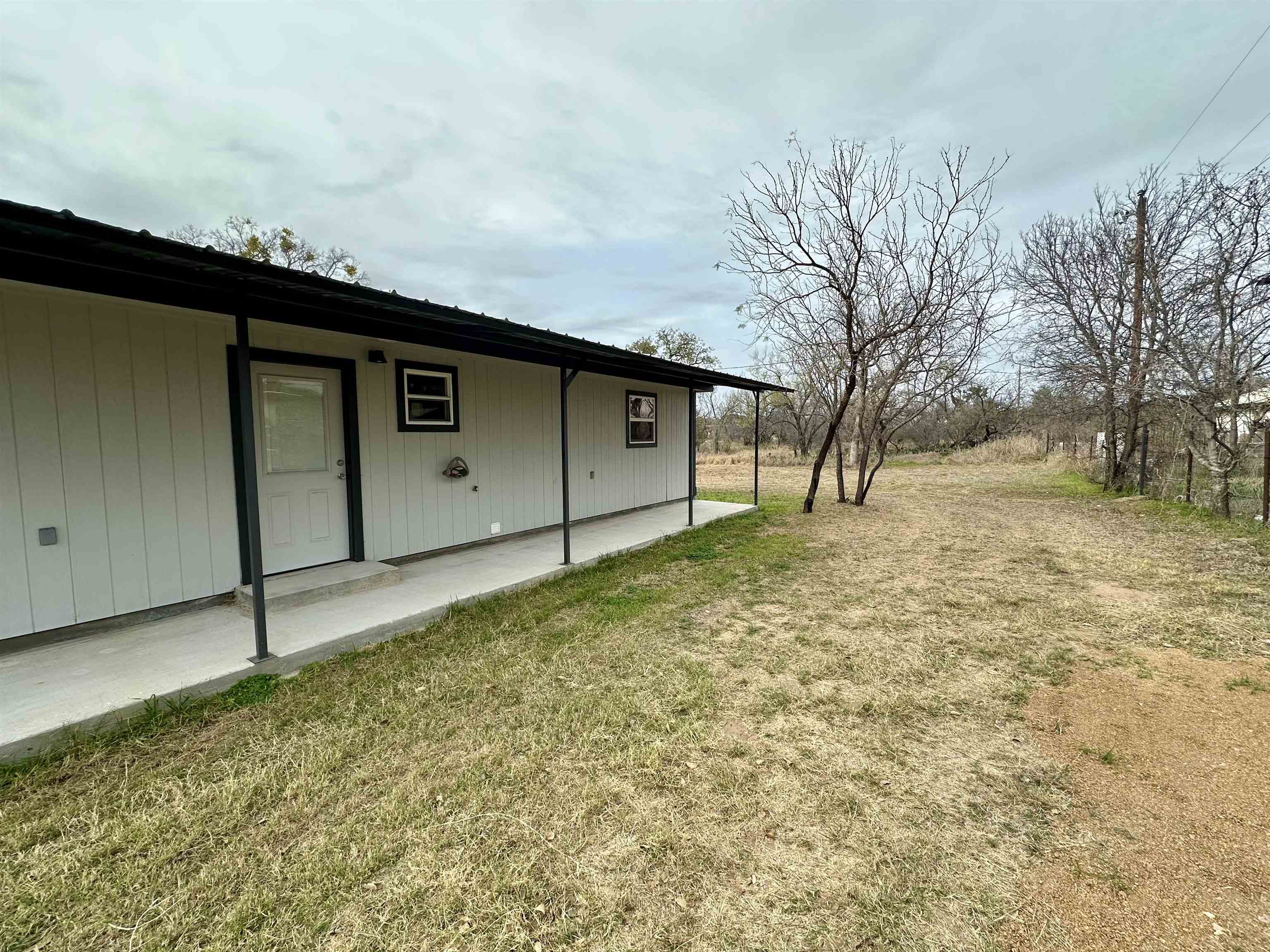 3410 Cactus Trail Kingsland, TX 78639 - Photo 25 of 26 a backyard of a house
