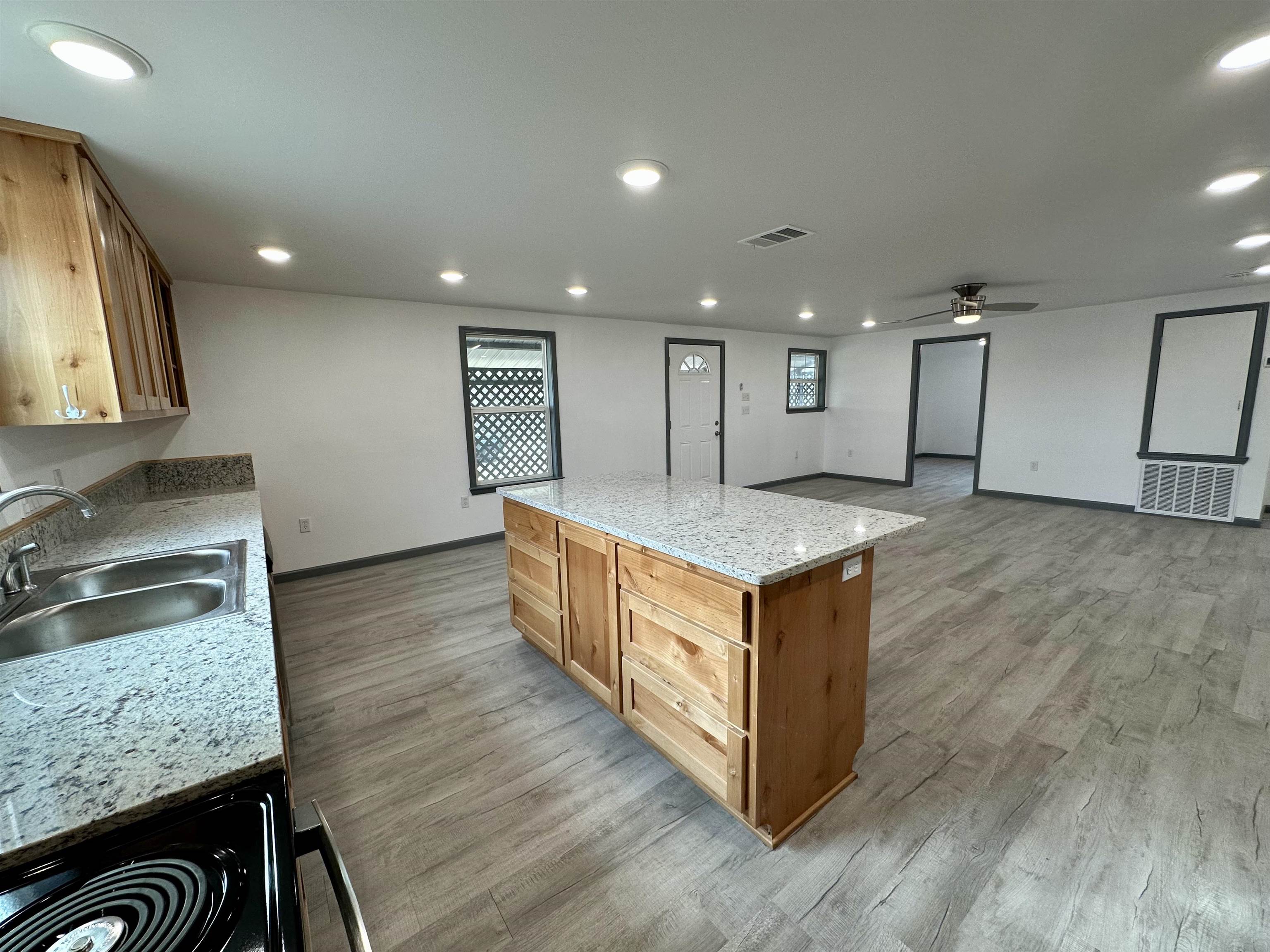 3410 Cactus Trail Kingsland, TX 78639 - Photo 9 of 26 a kitchen with a stove and a sink