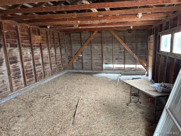 a front view of a house with yard and seating area
