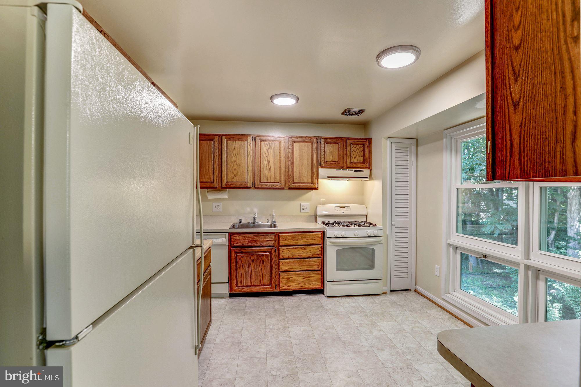 8110 Blairton Road Springfield, VA 22152 - Photo 8 of 23 Oak Cabinetry in Kitchen