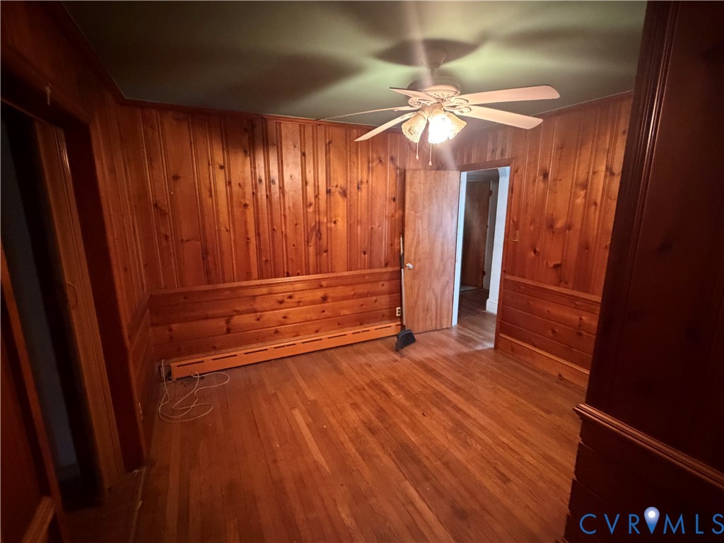 3605 Dill Road Richmond, VA 23222 - Photo 10 of 11 Room featuring full wood paneling walls, wood-fini