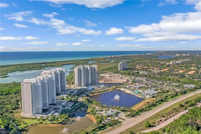a view of a city and ocean