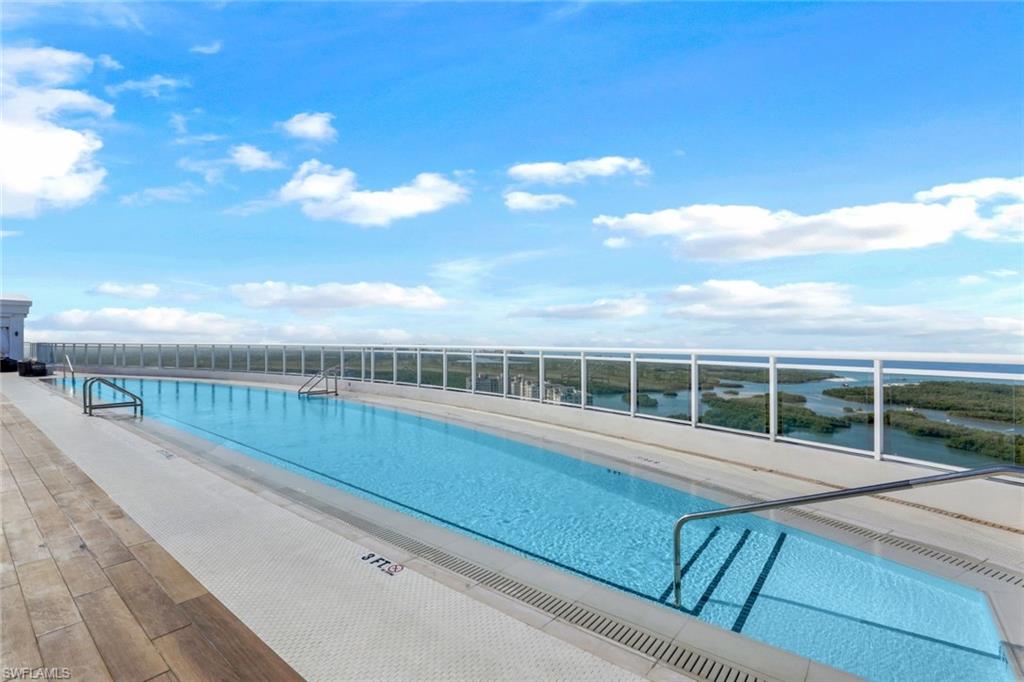 13915 Old Coast Road, Unit 502 Naples, FL 34110 - Photo 26 of 31 a view of a terrace with skyline