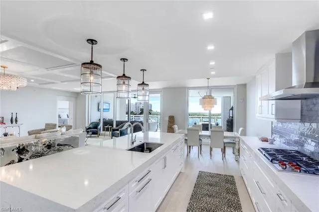 a view of a kitchen and dining room