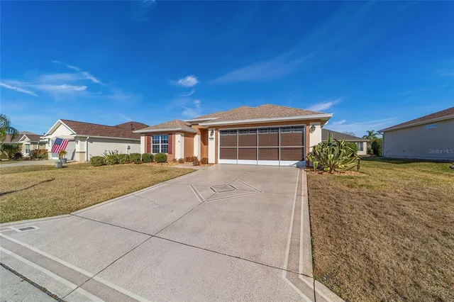 a house view with a garden space