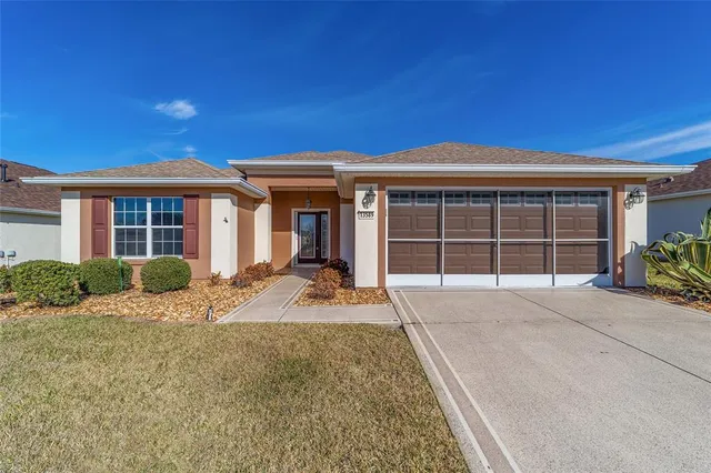a view of a hallway with wooden door
