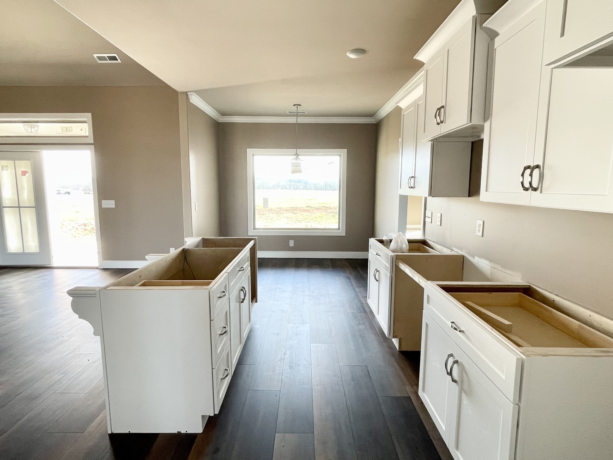 3262 Ostella Road Cornersville, TN 37047 - Photo 7 of 11 a kitchen with a sink and wooden floor