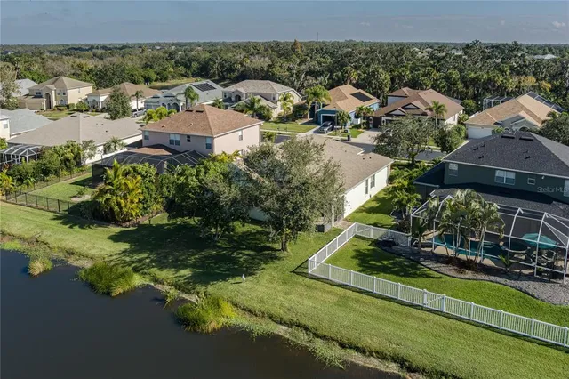 a view of a garden with a house