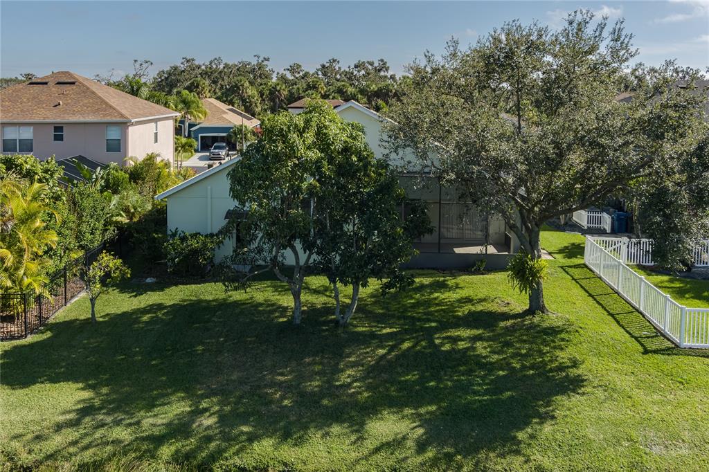 4420 85th Ave Circle East Parrish, FL 34219 - Photo 31 of 40 a view of a garden with a house