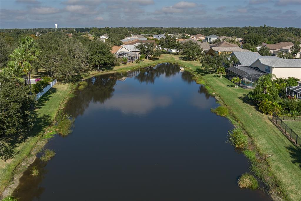 4420 85th Ave Circle East Parrish, FL 34219 - Photo 32 of 40 an aerial view of a house with a lake view