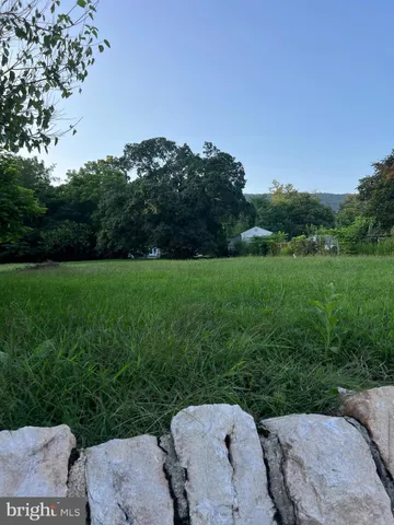 a view of a yard with porch