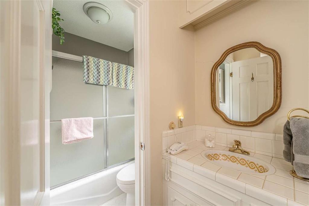 16 Cinnamon Lane Northeast Rome, GA 30161 - Photo 13 of 23 a bathroom with a sink a toilet and shower