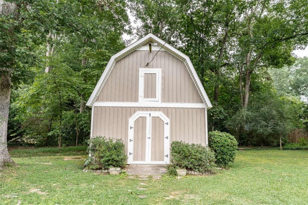 16 Cinnamon Lane Northeast Rome, GA 30161 - Photo 21 of 23 a view of a house with yard and plants