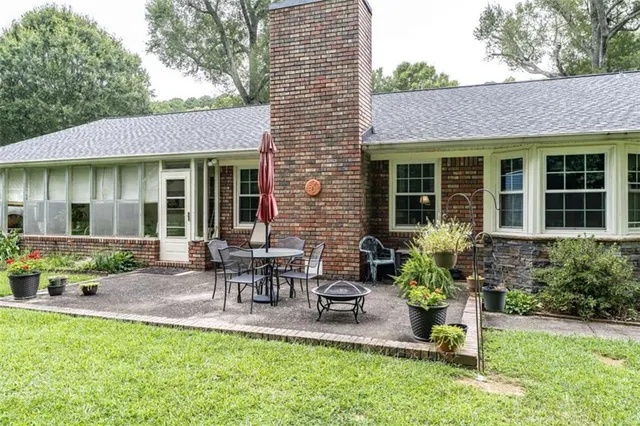 a house view with sitting space and garden space