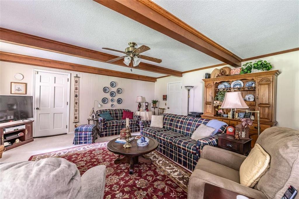16 Cinnamon Lane Northeast Rome, GA 30161 - Photo 5 of 23 a living room with furniture and a window