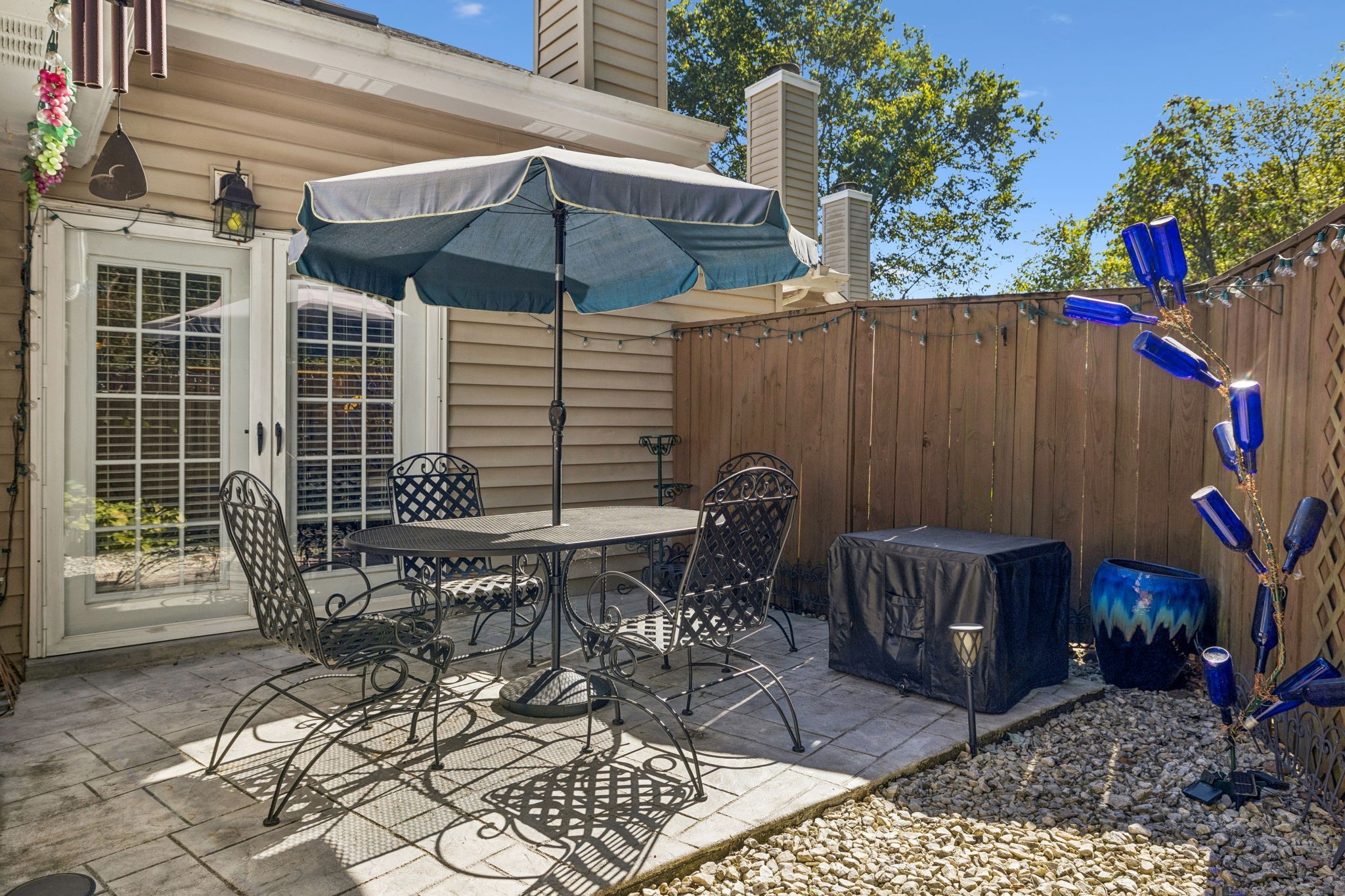 357 Yorkshire Circle Nashville, TN 37211 - Photo 11 of 44 a patio with table and chairs and potted plants
