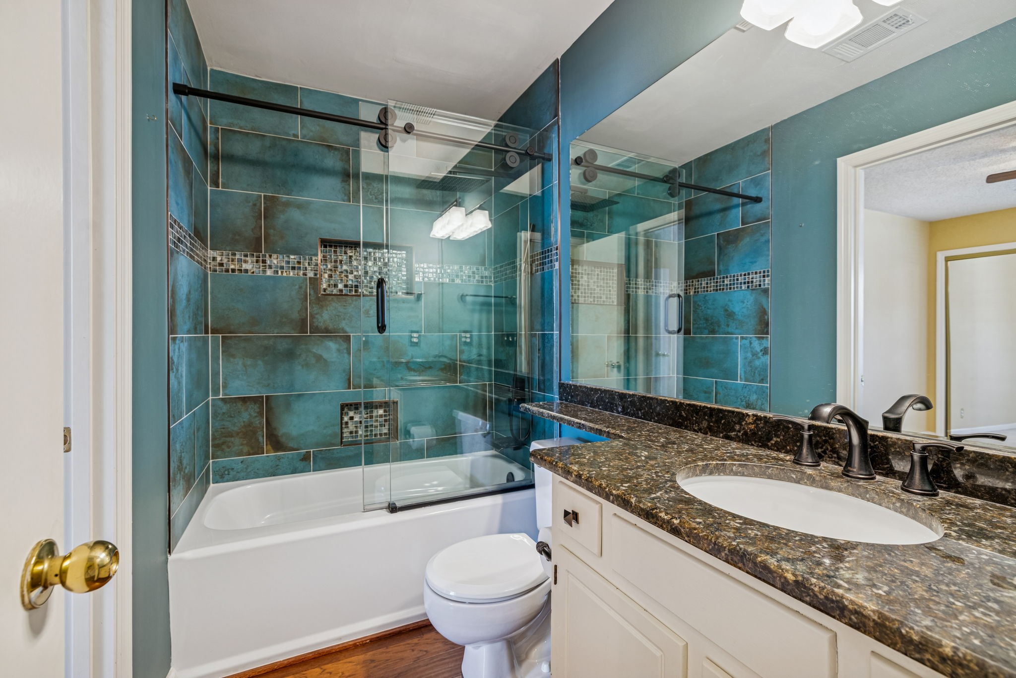 357 Yorkshire Circle Nashville, TN 37211 - Photo 32 of 44 a bathroom with a granite countertop tub sink toilet and mirror