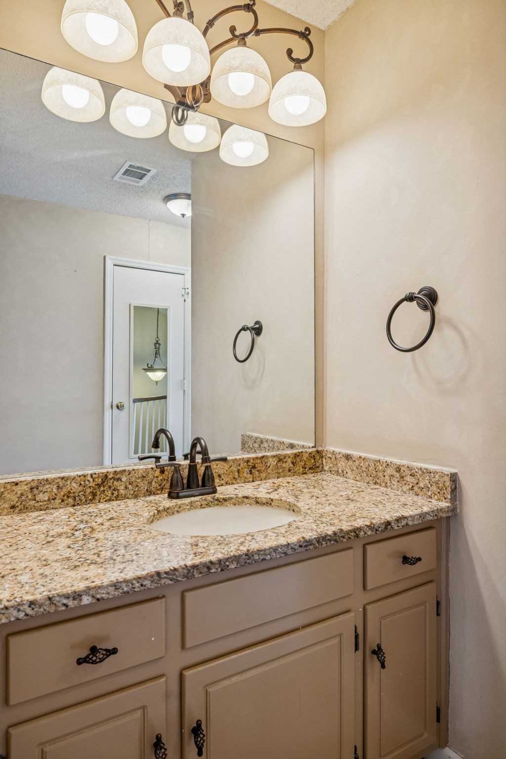 357 Yorkshire Circle Nashville, TN 37211 - Photo 38 of 44 a bathroom with a granite countertop sink and a mirror