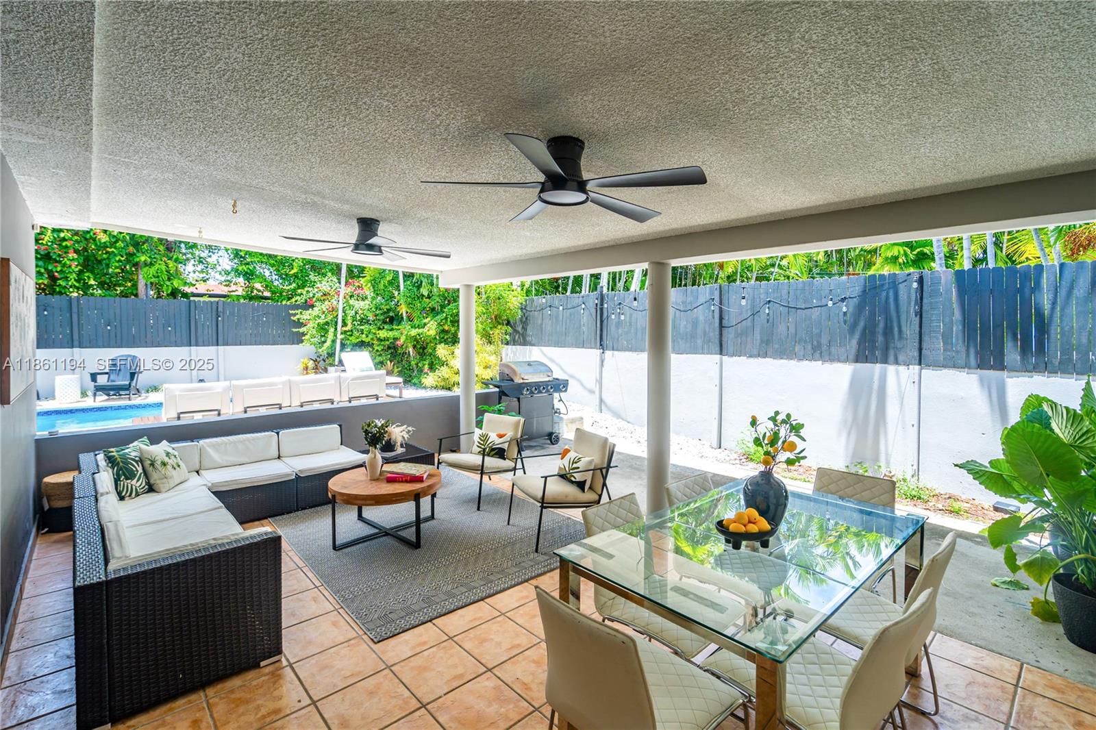 520 Southwest 22nd Road Miami, FL 33129 - Photo 11 of 71 a outdoor living space with furniture and garden view