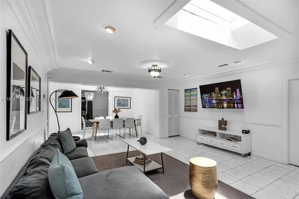 a bedroom with a bed and a night stand